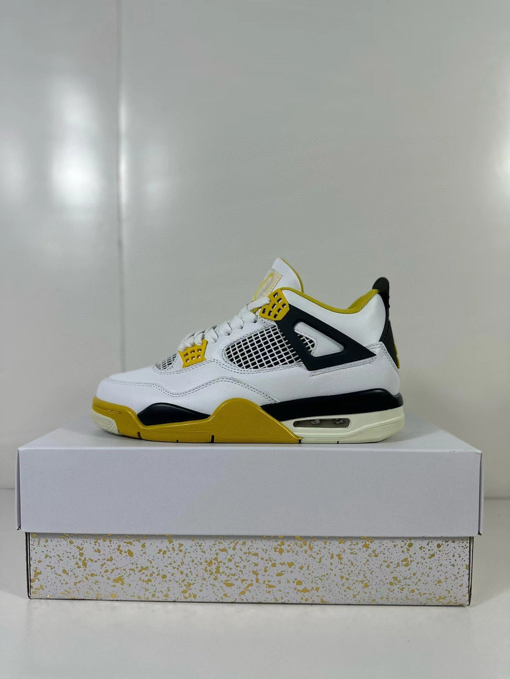 Air Jordan 4 Vivid Sulfur Sneakers White Yellow AQ9129-101 - product image from the listing.