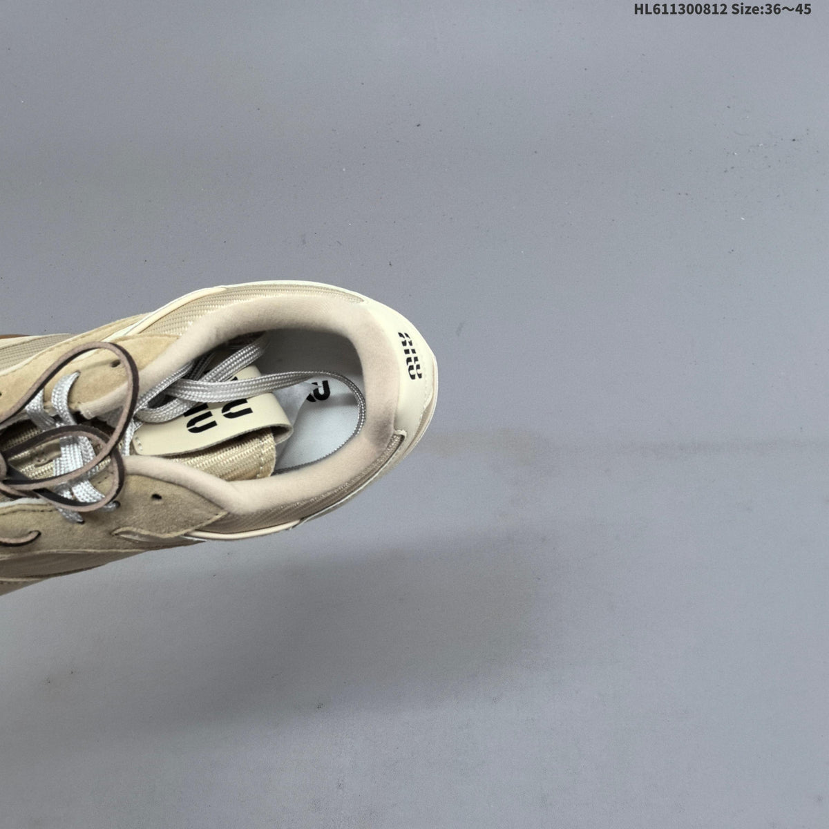Miu Miu x New Balance 530 SL Low-Top Sneakers in Beige - product image from the listing.