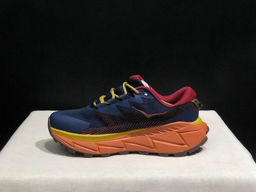 HOKA Skyline Float X Trail Sneakers in Navy Orange - product image from the listing.