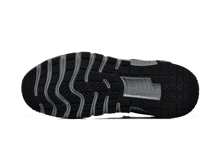Nike Free Run Low-Top Sneakers in Black and Grey - product image from the listing.