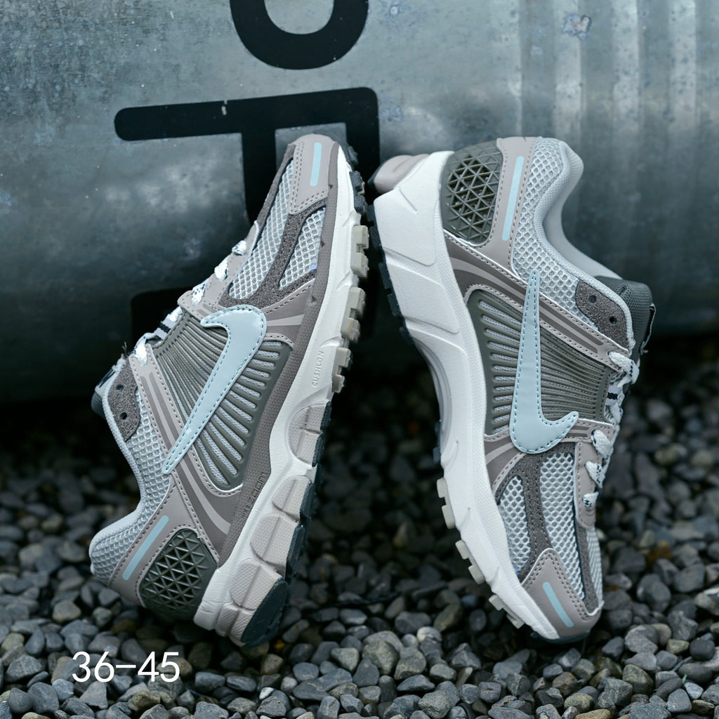 Grey Nike Air Zoom Vomero 5 Running Shoes - product image from the listing.
