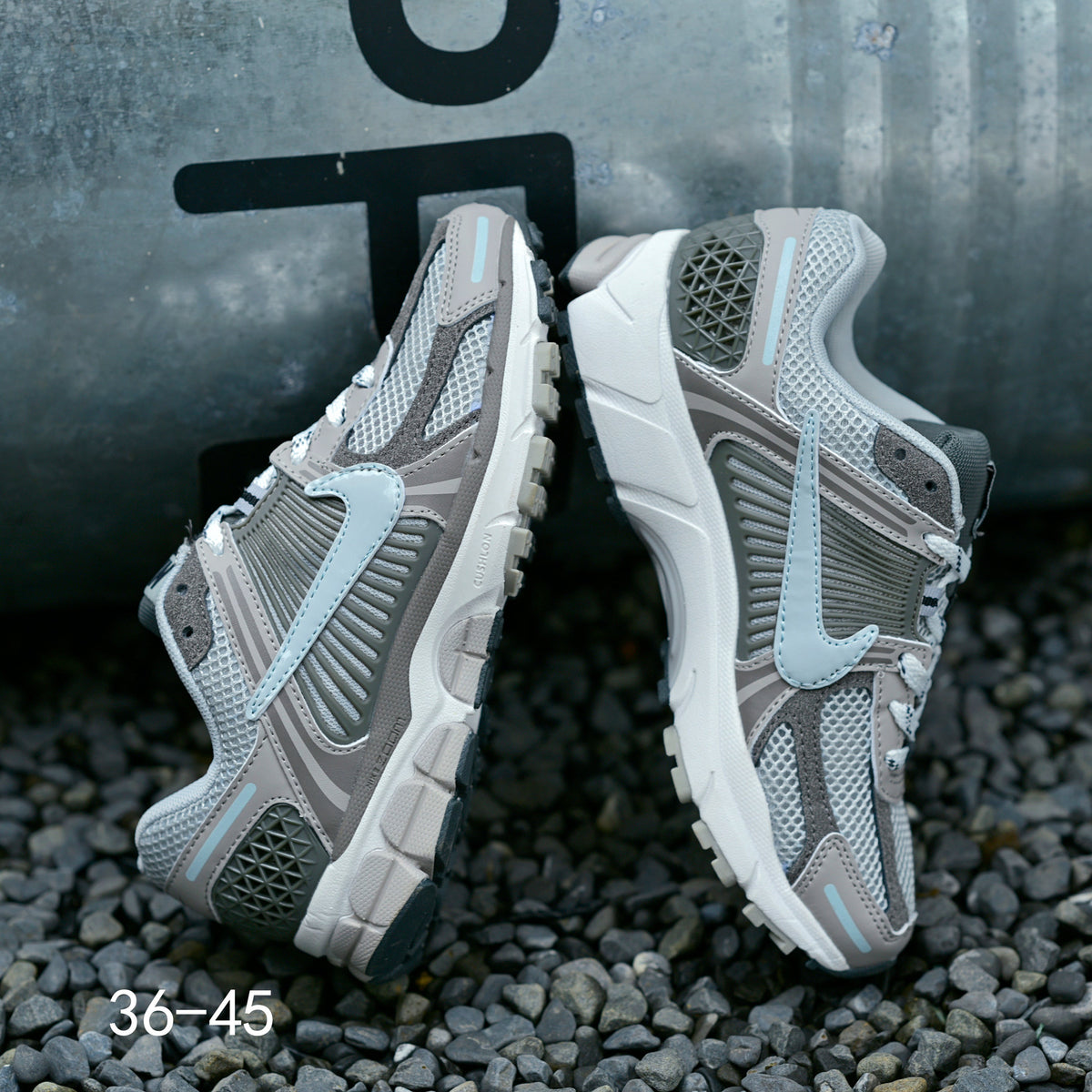 Grey Nike Air Zoom Vomero 5 Running Shoes - product image from the listing.