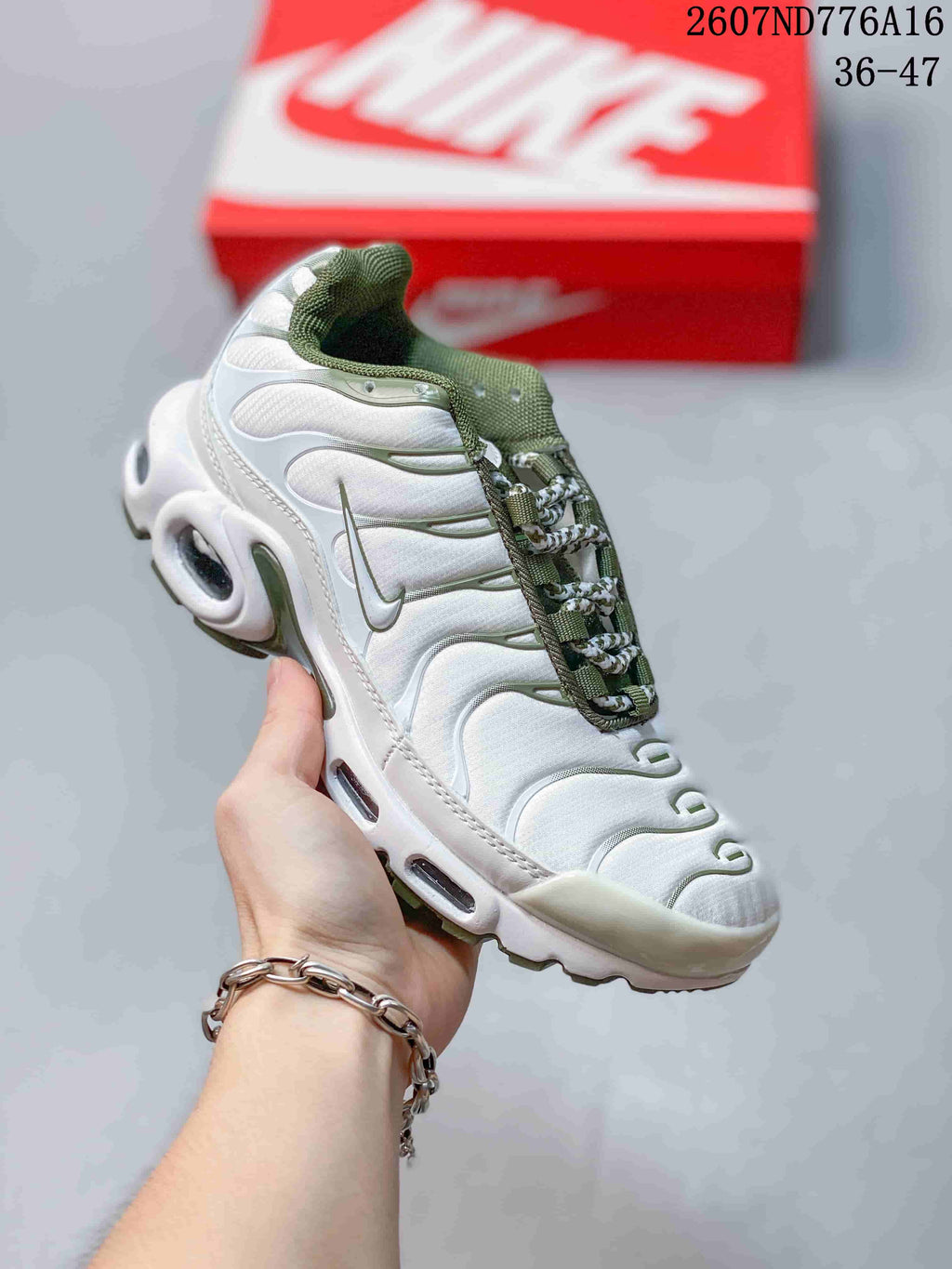 Nike Air Max Plus Sneakers in White and Green 2607ND776A16 - product image from the listing.
