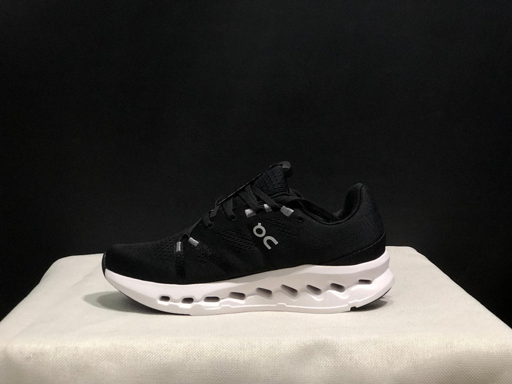 On Cloudsurfer Running Shoes in Black and White - product image from the listing.
