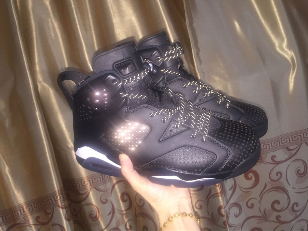 Jordan 6 Retro Black Cat High-Top Sneakers in Black and White - product image from the listing.