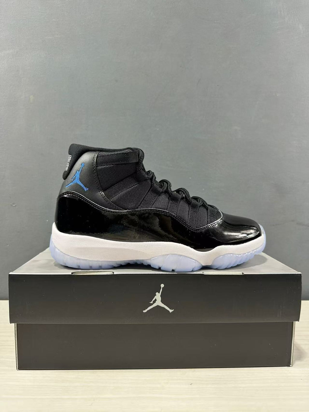 Air Jordan 11 Retro High Sneakers Black Blue CT8012-900 - product image from the listing.