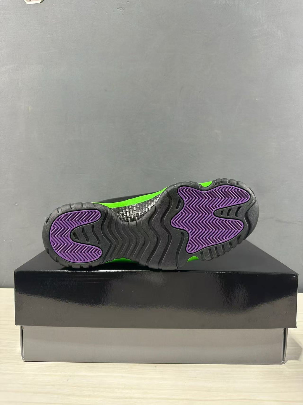 Air Jordan 11 Retro Sneakers in Black Green CT8012-310 - product image from the listing.