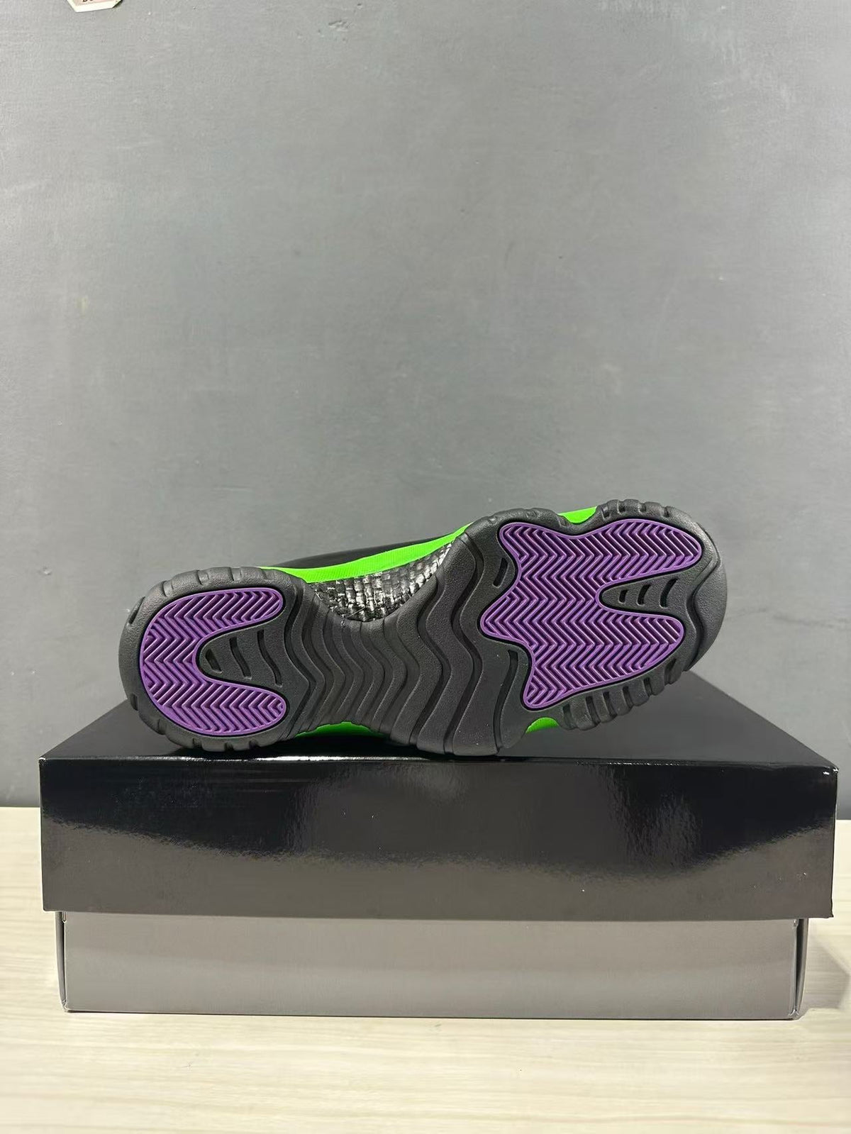 Air Jordan 11 Retro Sneakers in Black Green CT8012-310 - product image from the listing.