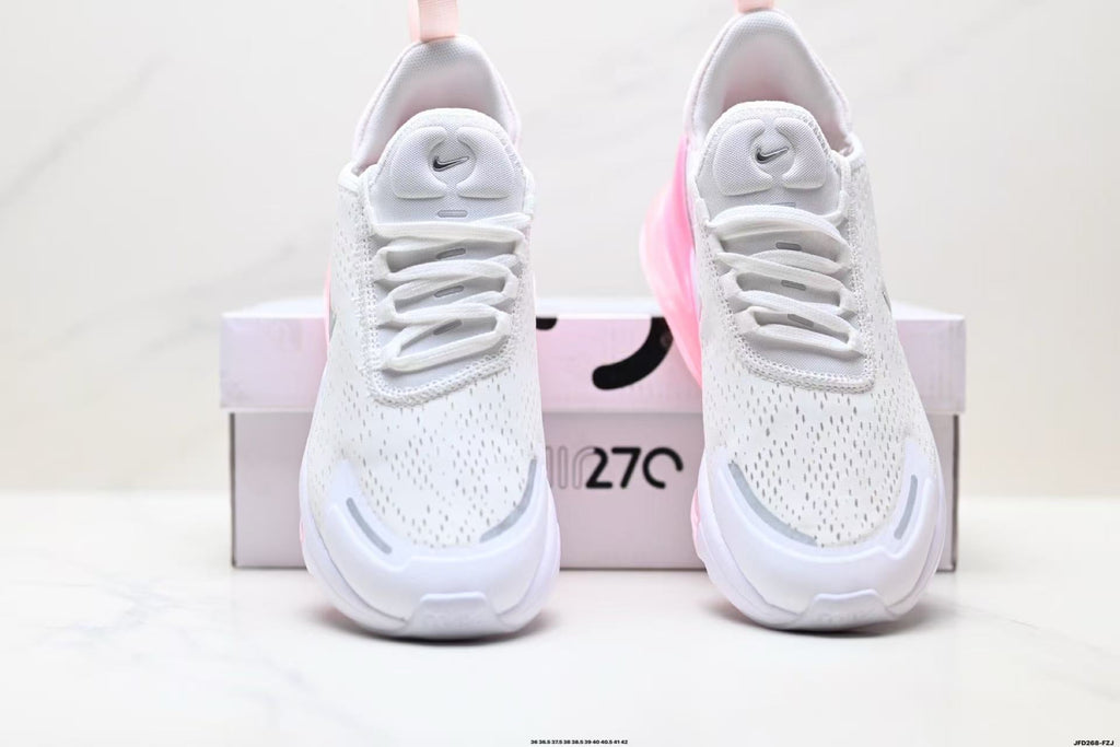 Nike Air Zoom Sneakers in White and Pink - product image from the listing.