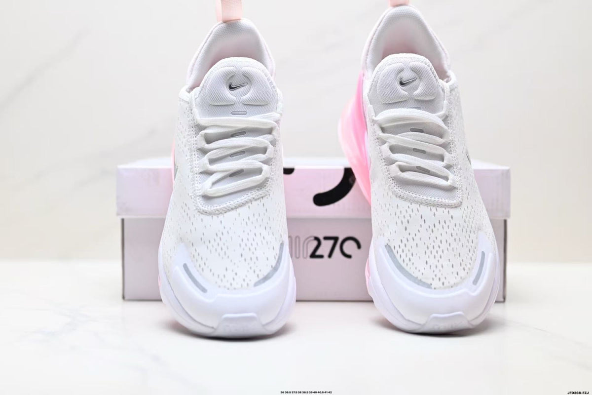 Nike Air Zoom Sneakers in White and Pink - product image from the listing.