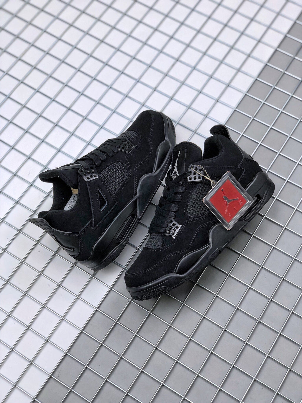 Air Jordan 4 Black Cat Sneakers CU1110-010 - product image from the listing.