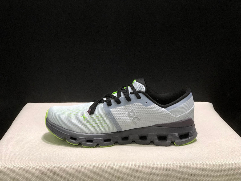 Gray and Lime On Cloud X 4 Sneakers - product image from the listing.