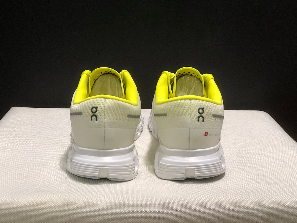 On Cloud 6 Push Sneakers in White and Yellow - product image from the listing.