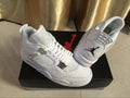 Air Jordan 4 Retro White High-Top Sneakers - product image from the listing.
