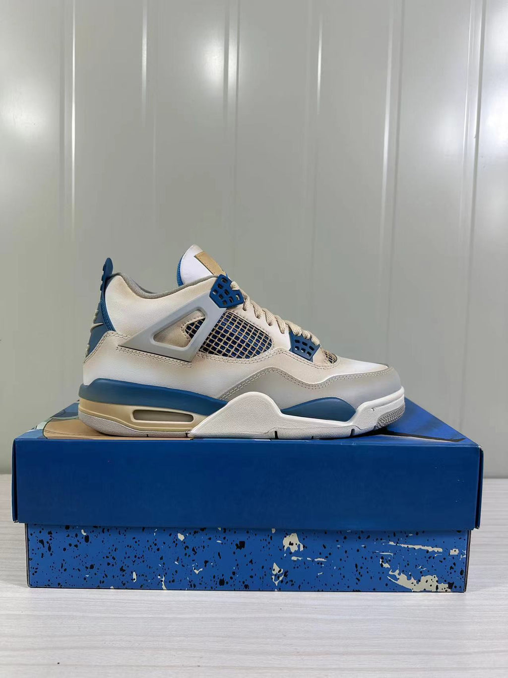 Air Jordan 4 Retro White Blue 308497-105 - product image from the listing.