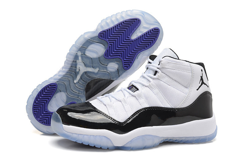 Air Jordan 11 Retro High White and Black Sneakers - product image from the listing.
