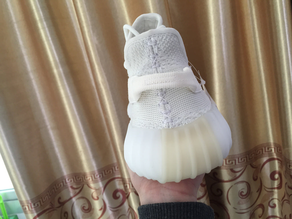 Yeezy 350 V2 Low-Top Sneakers in White Knit - product image from the listing.