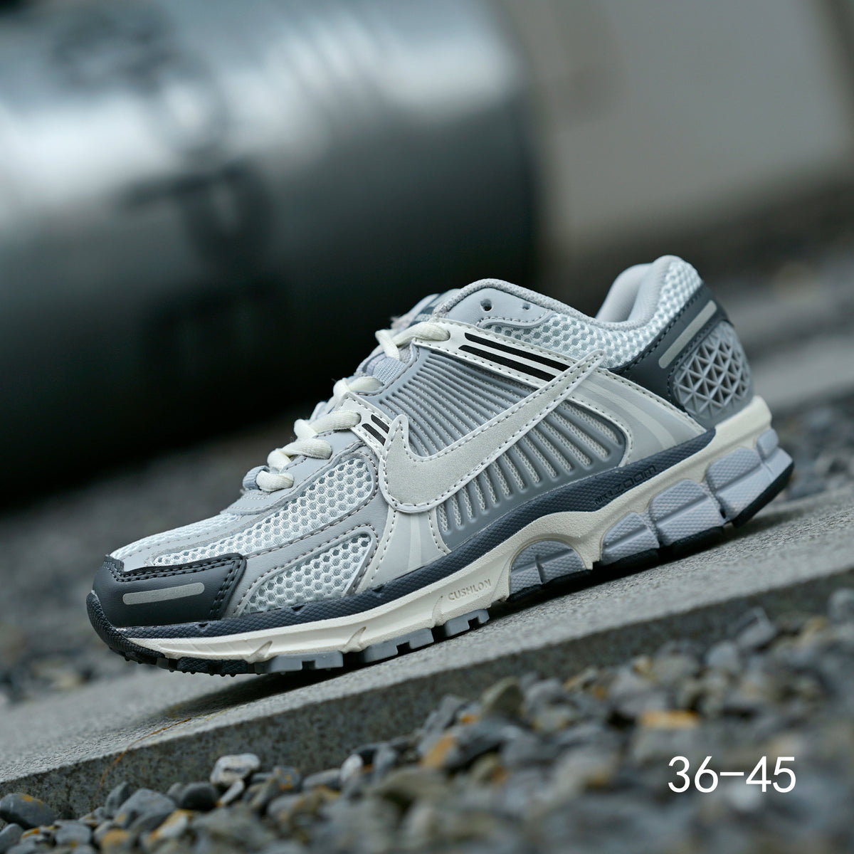 Light Gray and Navy Nike Air Zoom Vomero 5 Sneakers - product image from the listing.