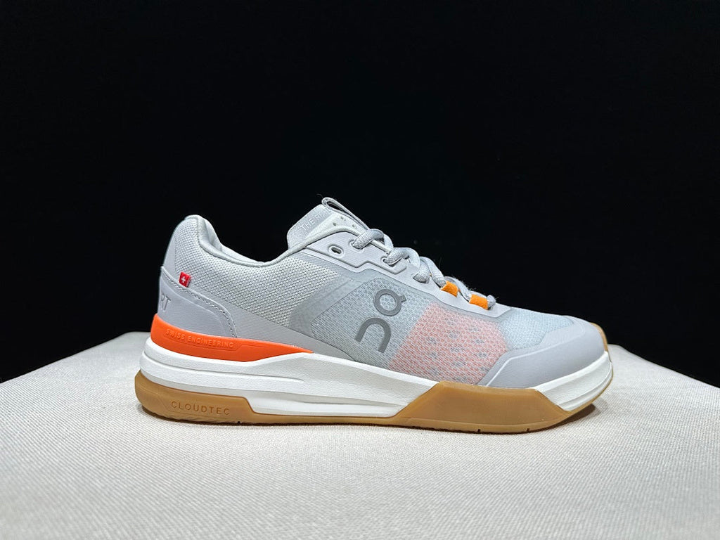 On THE ROGER Advantage Pro Tennis Shoes, in Grey and Orange - product image from the listing.