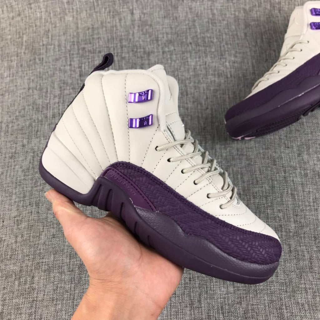 Air Jordan 12 White Purple Sneakers 510815-001 - product image from the listing.