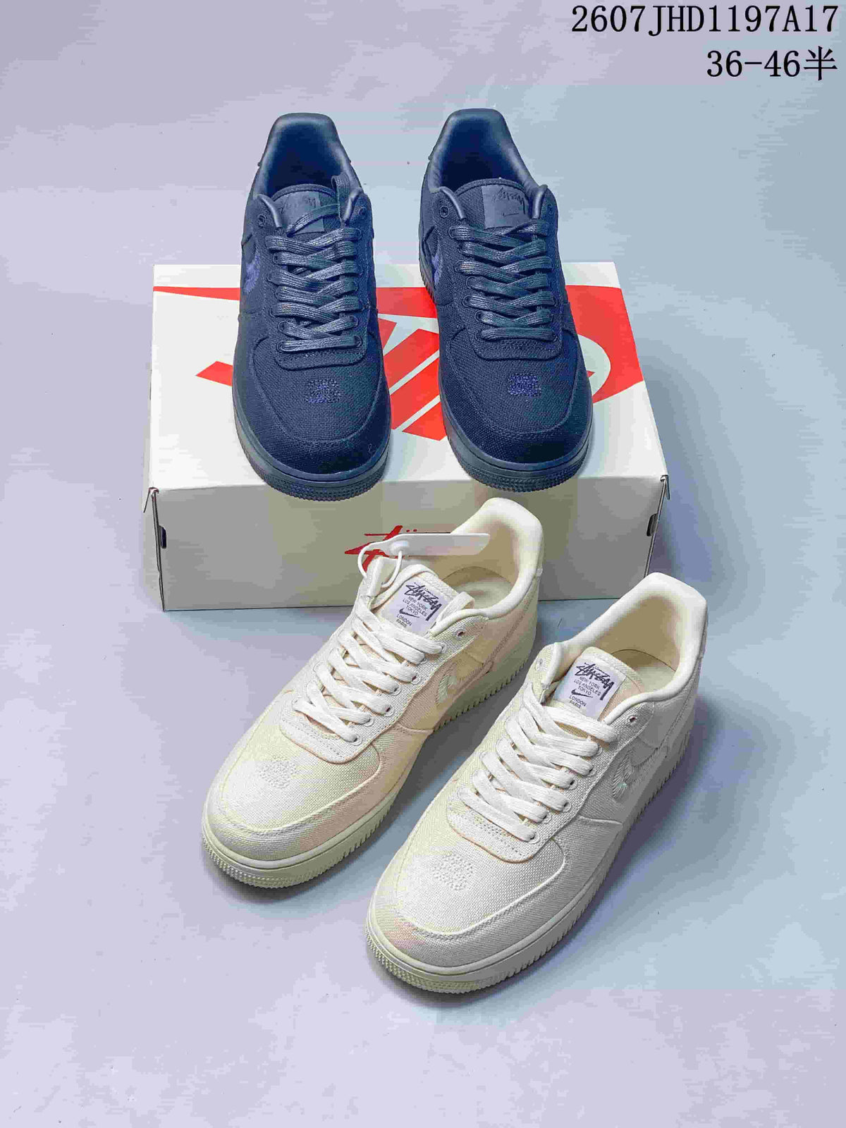 Black and Cream Nike Air Force 1 '07 x Stussy Sneakers - product image from the listing.