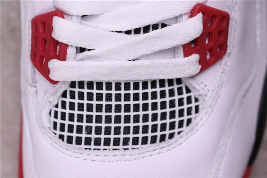 Air Jordan 4 Retro White Red Black Sneakers - product image from the listing.