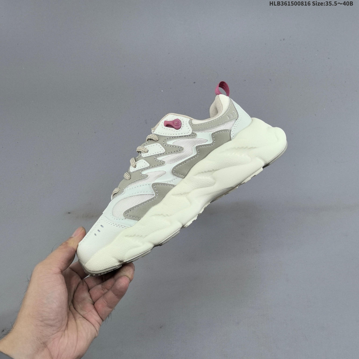 FILA Chunky Low-Top Sneakers in Cream or in Black - product image from the listing.