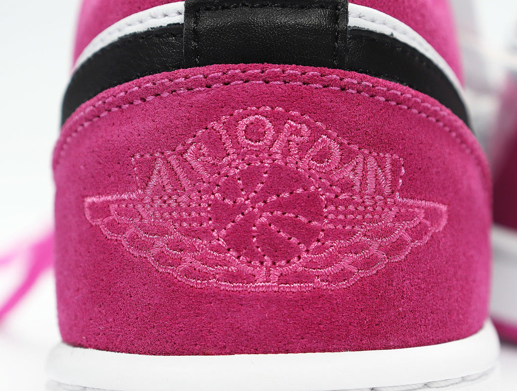 Jordan 1 Low Raspberry Sneakers in Pink Black White CK3022-005 - product image from the listing.