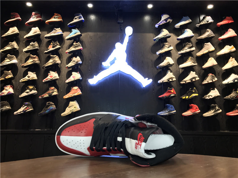 Air Jordan 1 High OG Sneakers in Black, Red and White - product image from the listing.