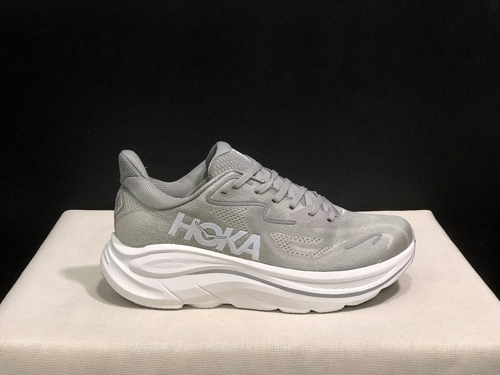 Gray HOKA Clifton 10 Running Shoes - product image from the listing.