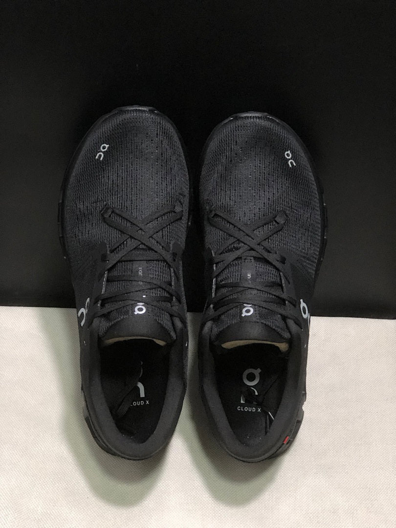 On Cloud X 4 Black Eclipse Trainers - product image from the listing.