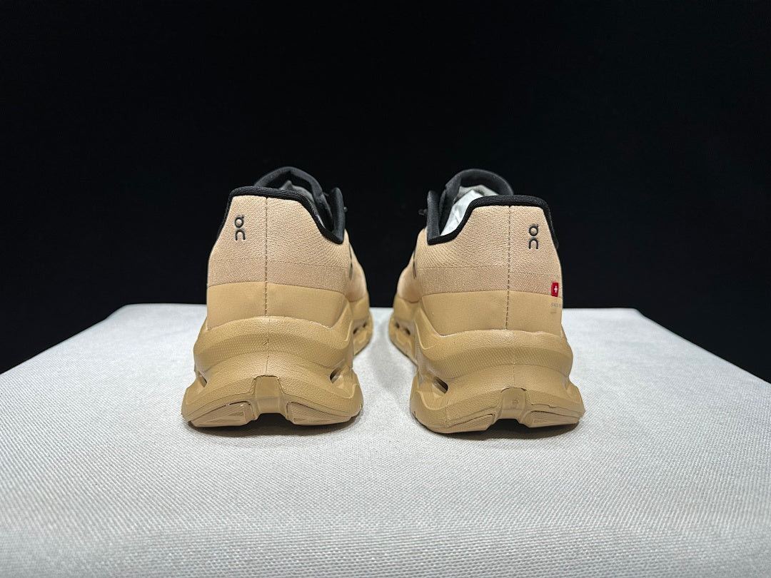 Brown and Black On Cloudtilt Sneakers - product image from the listing.