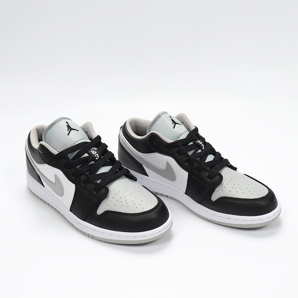 Jordan 1 Low Sneakers in Cool Grey 553560-039 - product image from the listing.