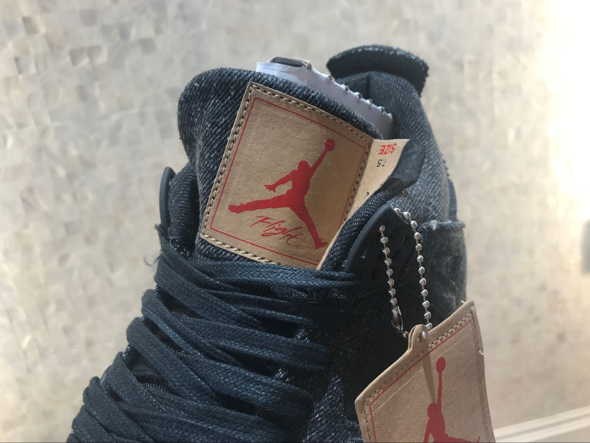 Jordan 4 Retro Levi's Sneakers in Black Denim A02571-001 - product image from the listing.
