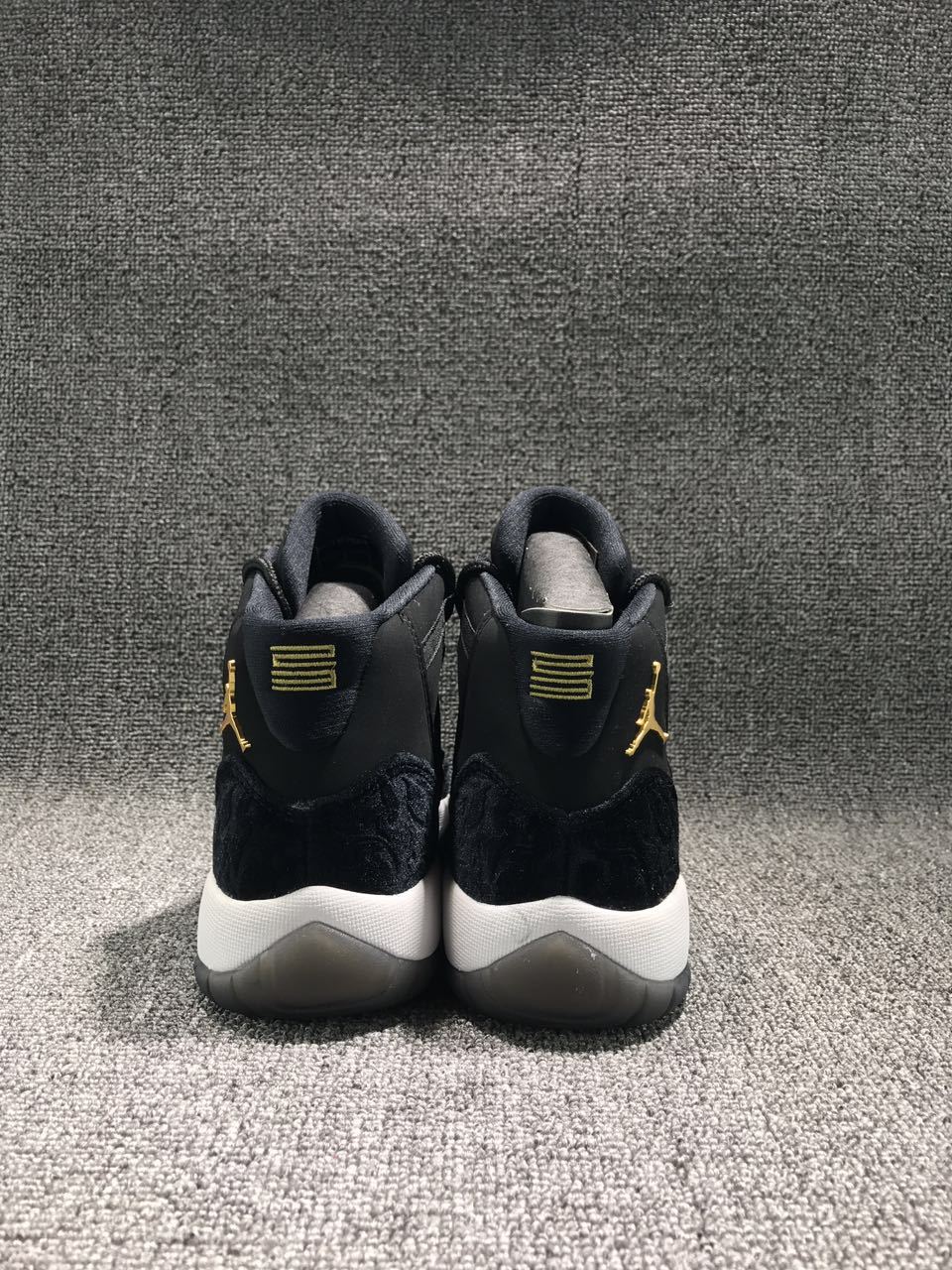 Jordan 11 Black Velvet High-Cut Sneakers - product image from the listing.