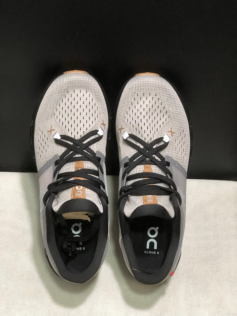 On Cloud X 4 Sneakers in Fog and in Black - product image from the listing.