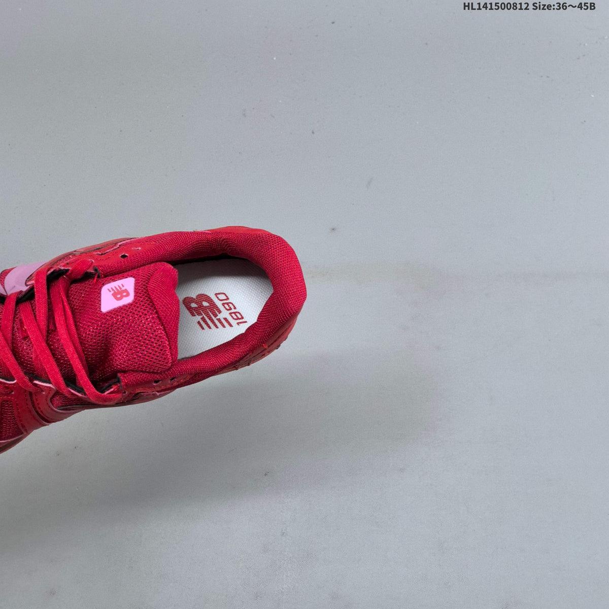 Red and Pink New Balance 18907 Sneakers - product image from the listing.