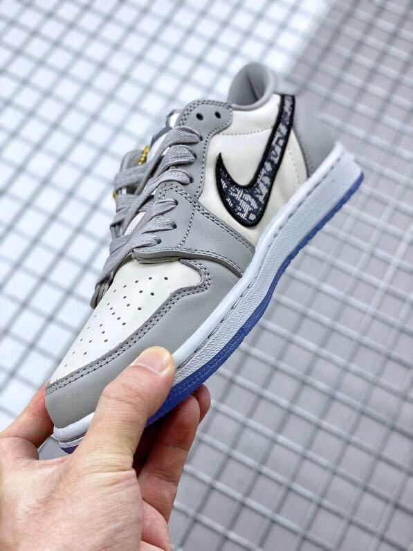 Dior x Air Jordan 1 Low Sneakers CN8608-002 in Grey - product image from the listing.