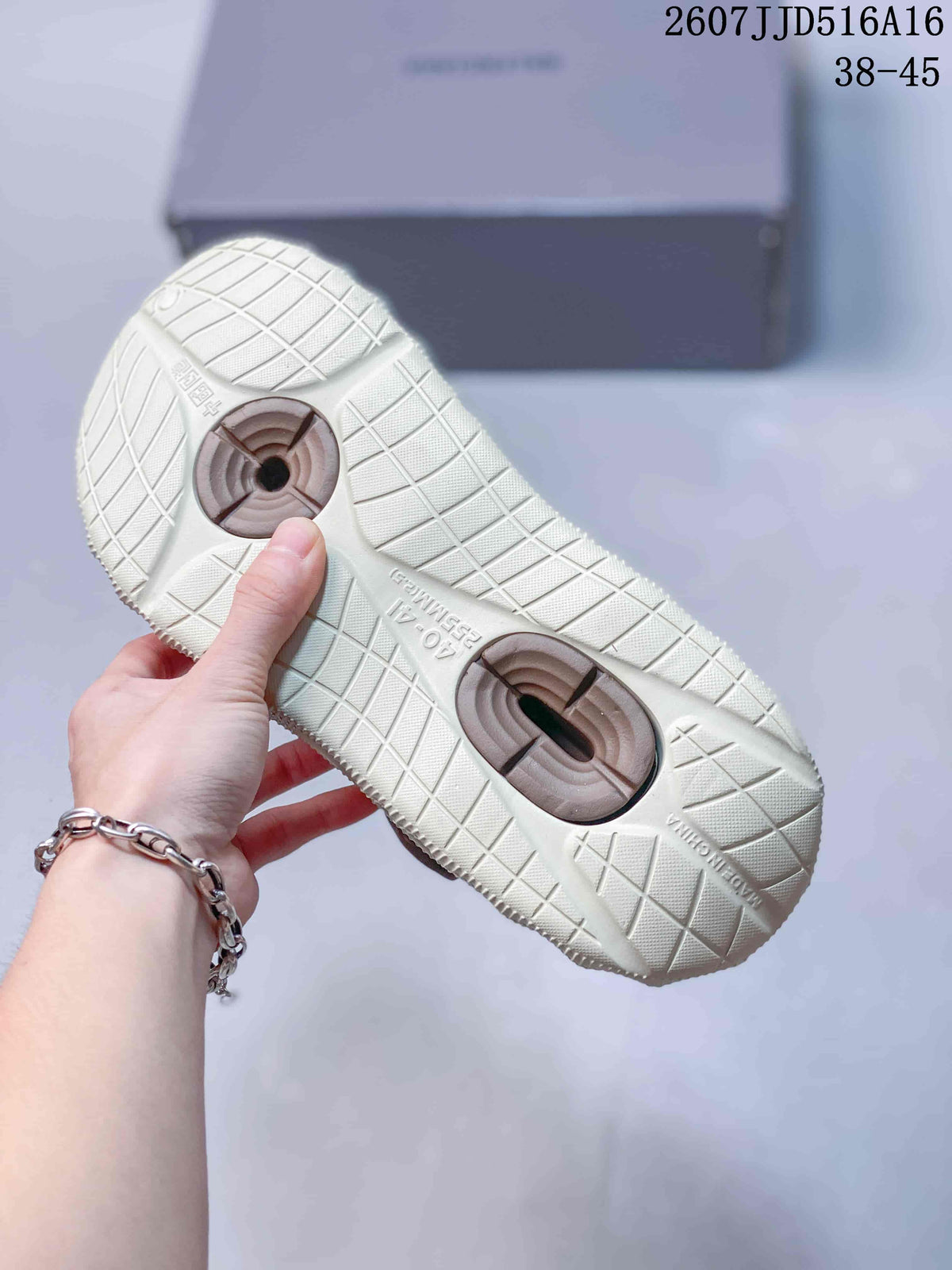 Balenciaga Molded Clog Slides in Cream Brown 2607JJD516A16 - product image from the listing.
