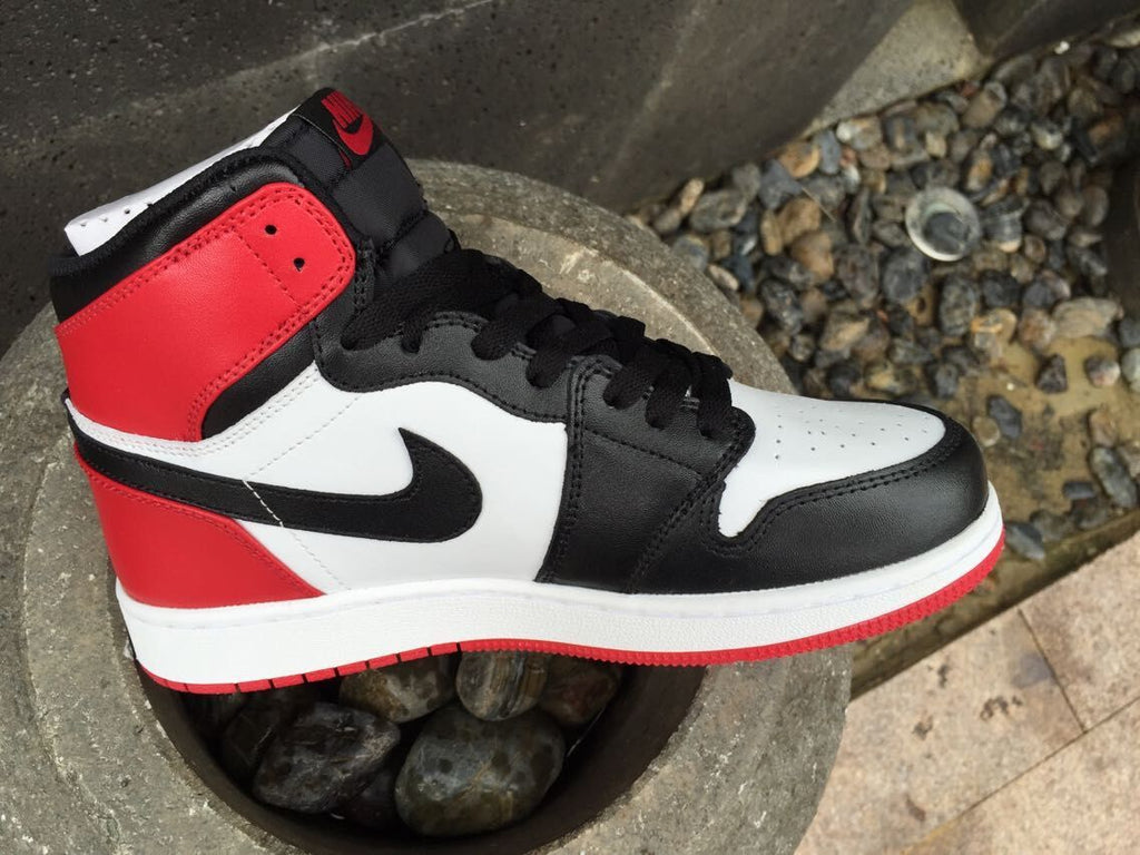 Jordan 1 High Sneakers in Black White Red - product image from the listing.