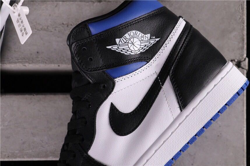 Air Jordan 1 Game Royal High-Top Sneakers in Black Blue White - product image from the listing.