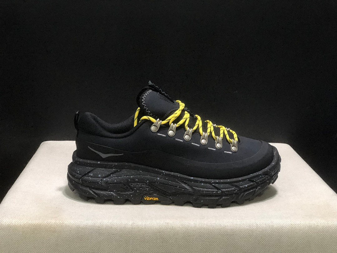 HOKA Tor Summit Trail Sneakers in Black and Yellow - product image from the listing.