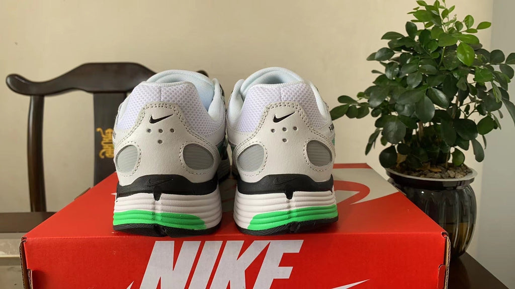 Nike P-6000 Sneakers in White Grey Green CD6404-104 - product image from the listing.