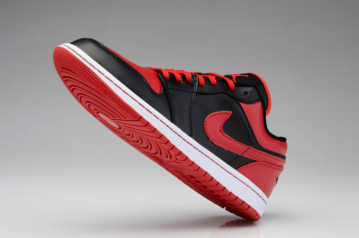Air Jordan 1 Low Black Red Sneakers - product image from the listing.