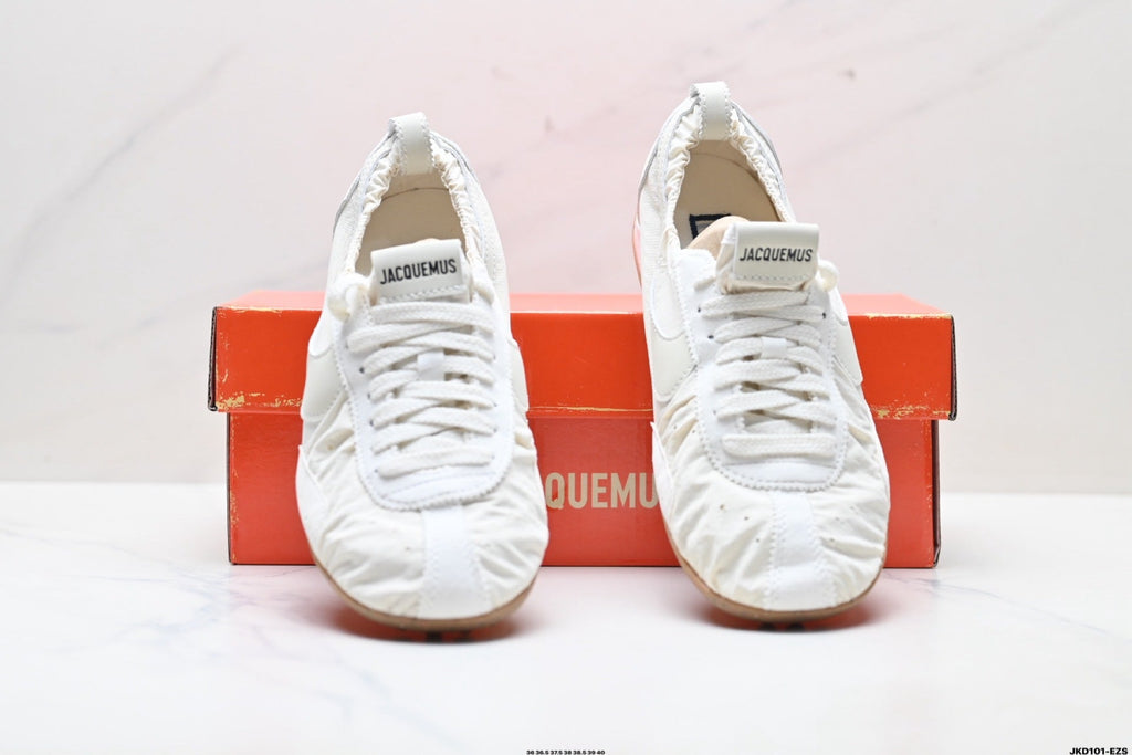 White Jacquemus x Nike Jacumoon Sneakers - product image from the listing.