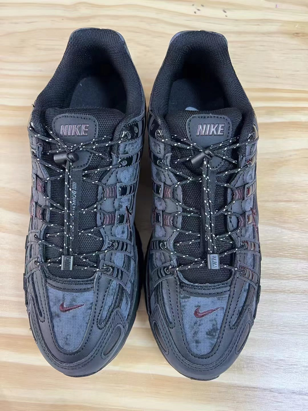 Nike P-6000 Trainers, Black and Gray, HQ4054-001 - product image from the listing.