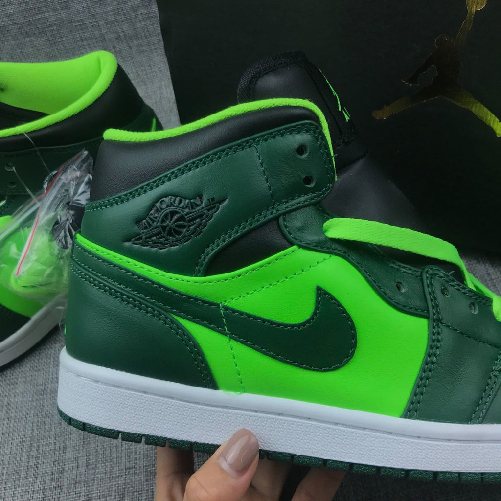 Air Jordan 1 Mid Fluorescent Sneakers in Green 554724-330 - product image from the listing.
