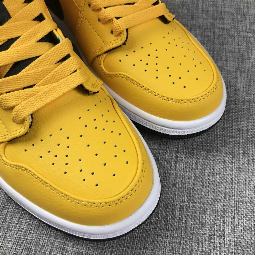 Air Jordan 1 Mid Sneakers in University Gold Black White - product image from the listing.