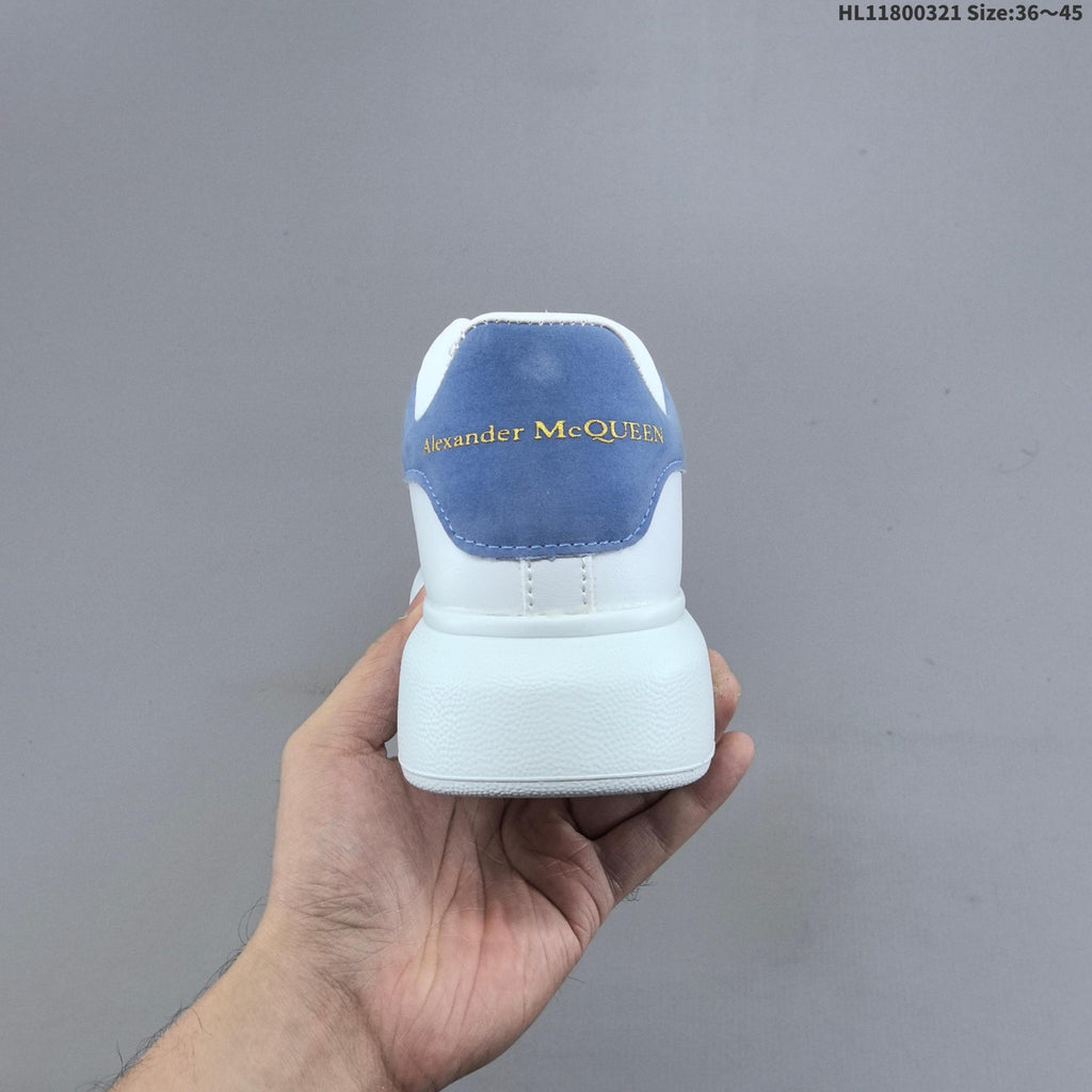 Alexander McQueen Oversized Low-Top Sneakers, in White and Blue - product image from the listing.