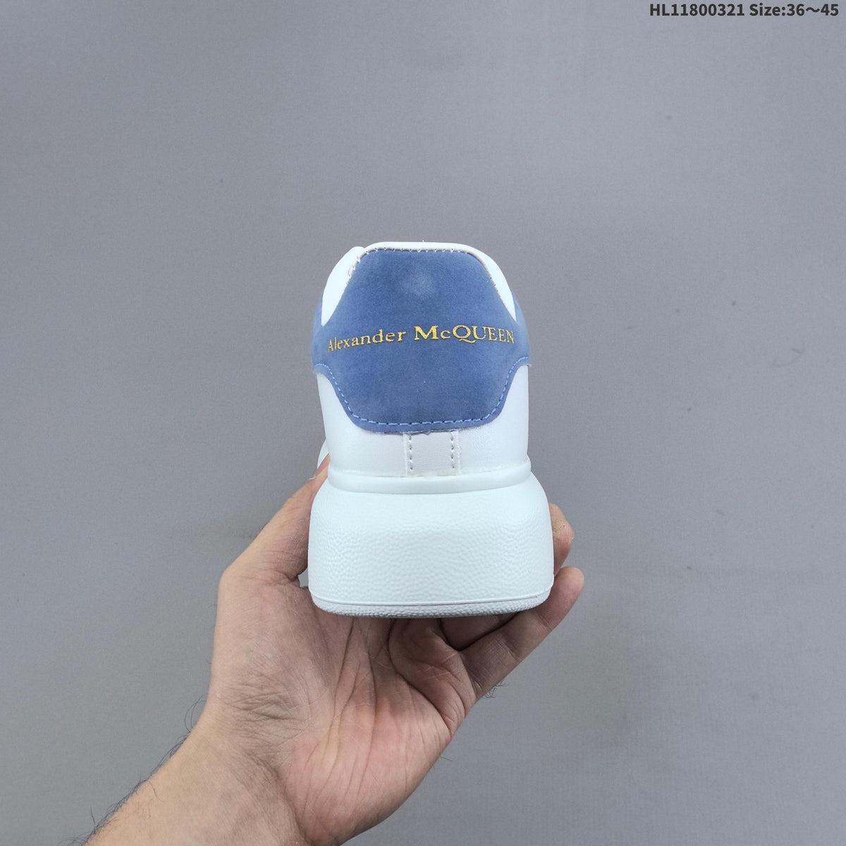 Alexander McQueen Oversized Low-Top Sneakers, in White and Blue - product image from the listing.